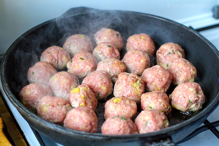 Cooking healthy meatballs in a frying pan