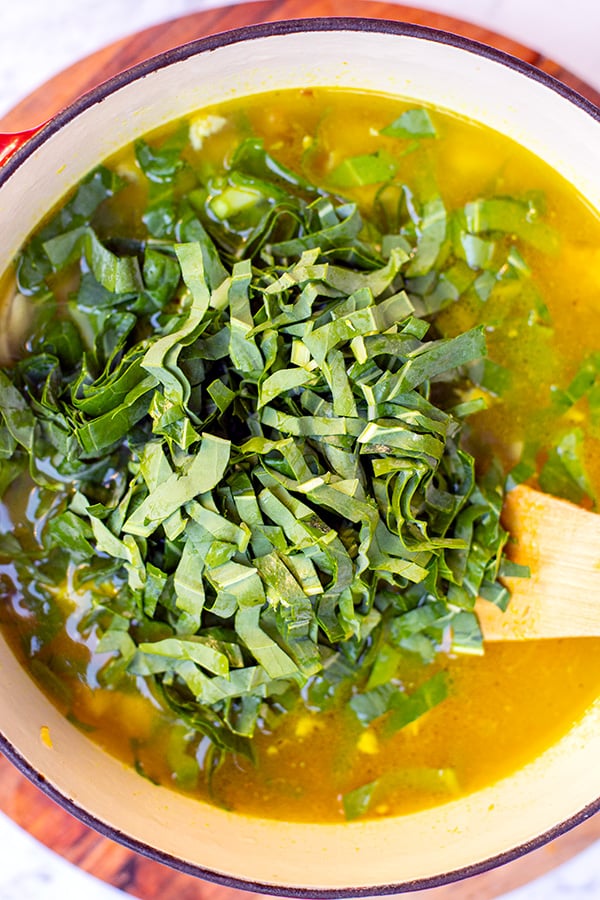 Add Asian greens to chicken soup 